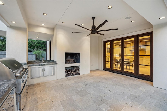 1039 Kirby Dr, Houston, TX 77019 - living room with stone tile flooring, recessed lighting, and a ceiling fan