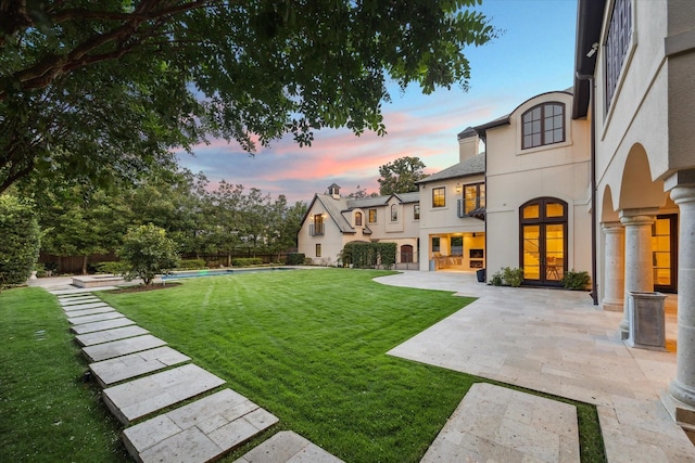 1039 Kirby Dr, Houston, TX 77019 - view of yard with a patio and french doors
