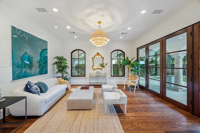 1039 Kirby Dr, Houston, TX 77019 - living area featuring ornamental molding, a chandelier, recessed lighting, and wood finished floors