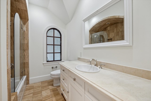 1039 Kirby Dr, Houston, TX 77019 - bathroom featuring vanity, vaulted ceiling, and tub / shower combination