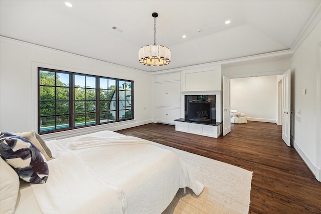 1039 Kirby Dr, Houston, TX 77019 - bedroom with dark wood-type flooring, a chandelier, crown molding, and recessed lighting