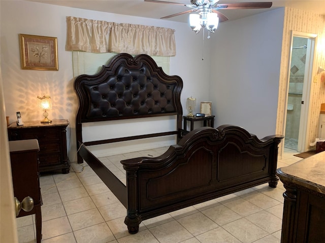 2709 8th Ave N, Texas City, TX 77590 - bedroom with light tile patterned floors, ensuite bathroom, and ceiling fan