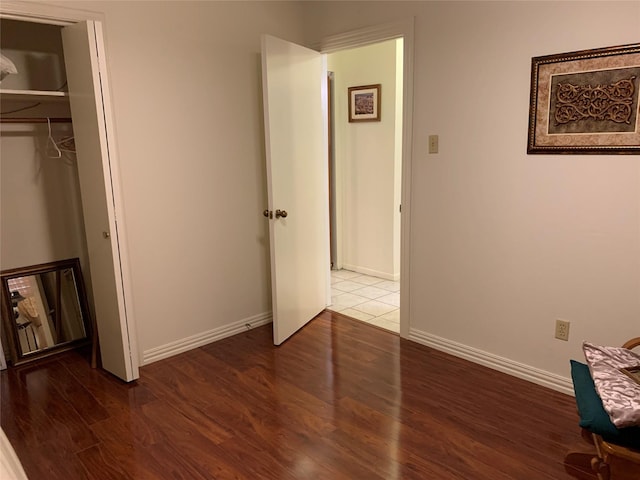 2709 8th Ave N, Texas City, TX 77590 - unfurnished bedroom with wood finished floors and a closet