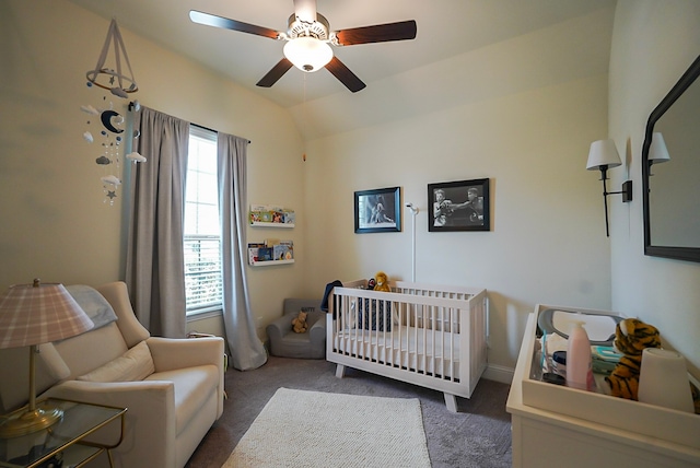 13114 Sierra National Dr, Humble, TX 77346 - bedroom featuring carpet floors, a crib, a ceiling fan, and vaulted ceiling