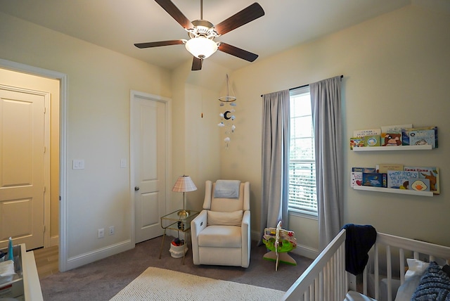 13114 Sierra National Dr, Humble, TX 77346 - bedroom featuring multiple windows, carpet flooring, a nursery area, and a ceiling fan