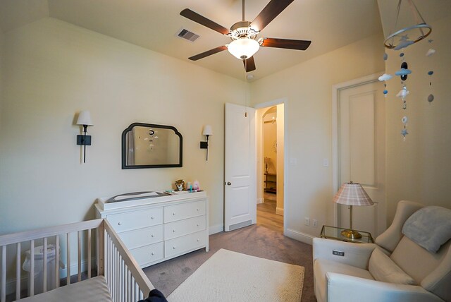 13114 Sierra National Dr, Humble, TX 77346 - bedroom with carpet floors, a crib, and ceiling fan