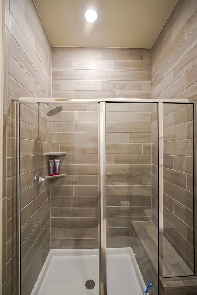13114 Sierra National Dr, Humble, TX 77346 - bathroom featuring a shower stall