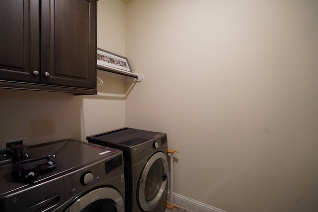 13114 Sierra National Dr, Humble, TX 77346 - laundry area featuring cabinet space and independent washer and dryer