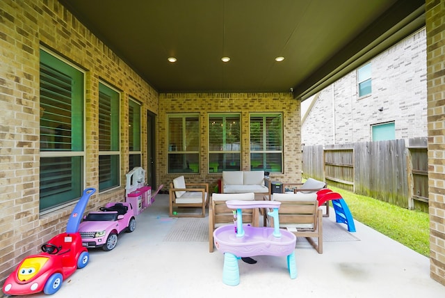 13114 Sierra National Dr, Humble, TX 77346 - view of patio / terrace with an outdoor hangout area