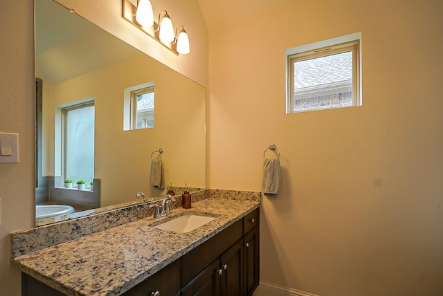13114 Sierra National Dr, Humble, TX 77346 - bathroom with vanity and a tub