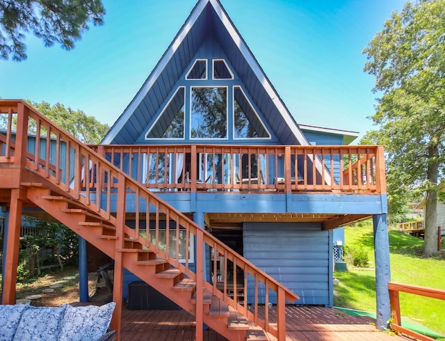 169 N County Road 4945, Etoile, TX 75944 - back of house featuring a deck and stairs