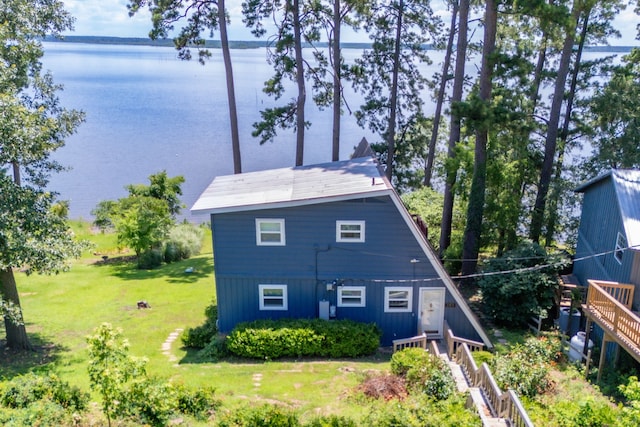 169 N County Road 4945, Etoile, TX 75944 - rear view of house featuring a water view and a yard