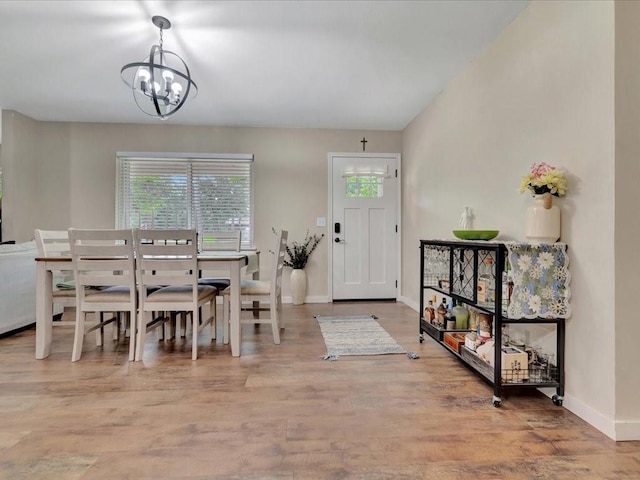 222 Beechnut Cir, Lufkin, TX 75904 - dining space featuring a chandelier and wood finished floors