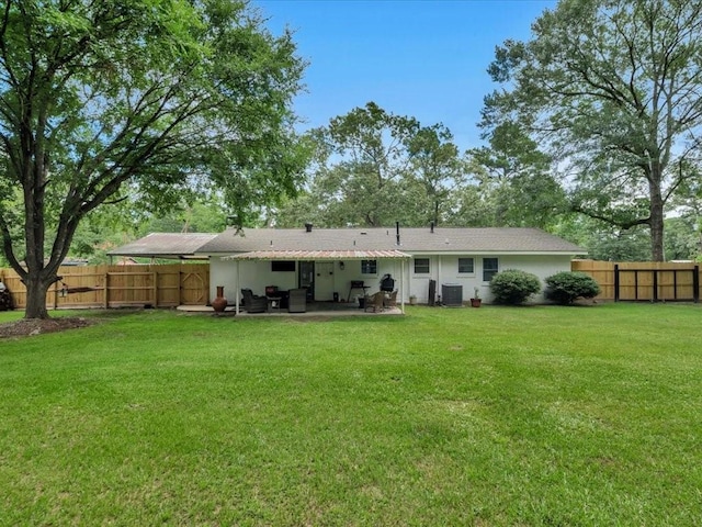 222 Beechnut Cir, Lufkin, TX 75904 - back of house with a fenced backyard and a patio