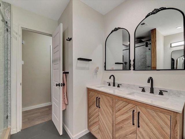 222 Beechnut Cir, Lufkin, TX 75904 - full bathroom featuring double vanity and tiled shower