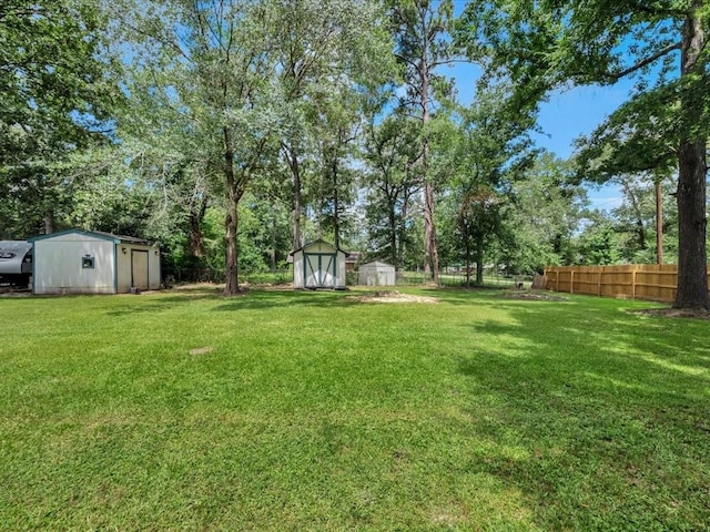 222 Beechnut Cir, Lufkin, TX 75904 - view of yard featuring a storage shed and view of scattered trees