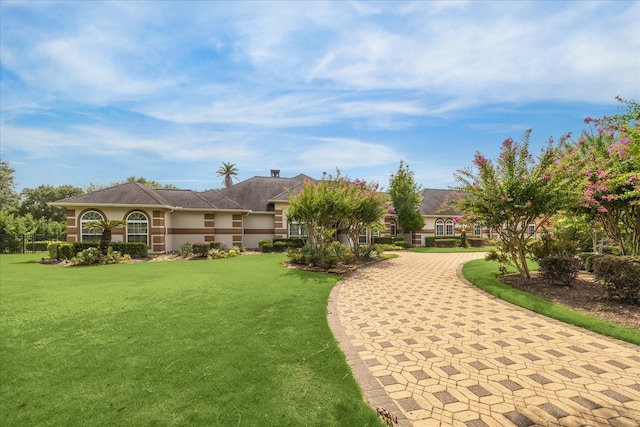 9603 Stonebridge Pl, Tomball, TX 77375 - view of home's community with a yard