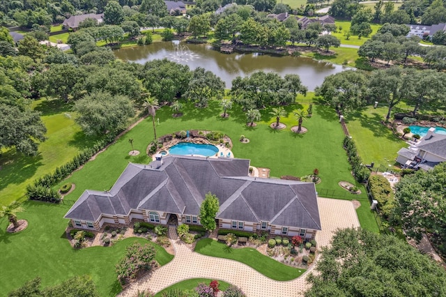 9603 Stonebridge Pl, Tomball, TX 77375 - view of subject property with a large body of water and a tree filled landscape