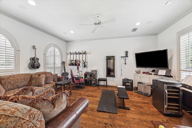 9603 Stonebridge Pl, Tomball, TX 77375 - living area with crown molding, a ceiling fan, dark wood-style floors, and recessed lighting