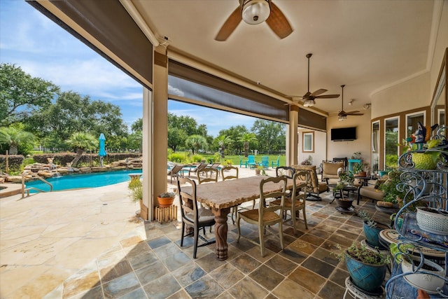 9603 Stonebridge Pl, Tomball, TX 77375 - view of patio featuring a ceiling fan, an outdoor pool, and an outdoor living space