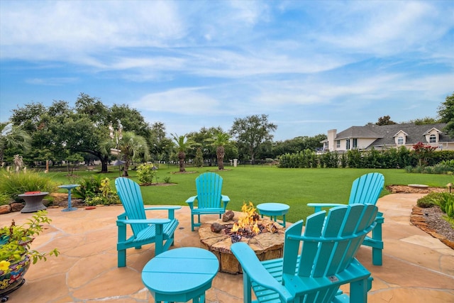 9603 Stonebridge Pl, Tomball, TX 77375 - view of patio featuring an outdoor fire pit