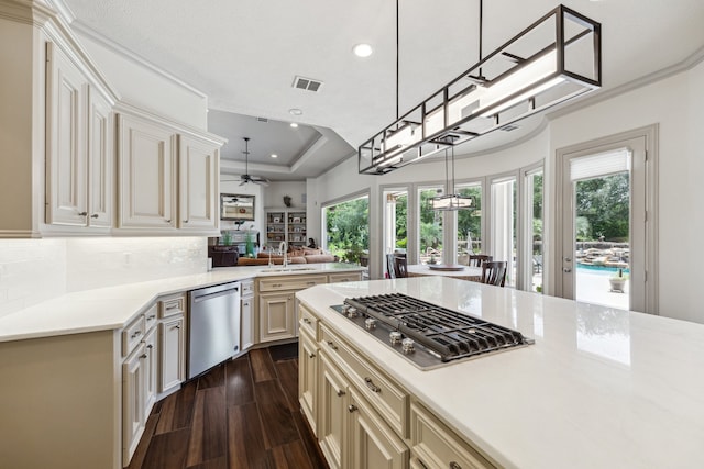 9603 Stonebridge Pl, Tomball, TX 77375 - kitchen with stainless steel appliances, dark wood finished floors, ceiling fan, light countertops, and recessed lighting