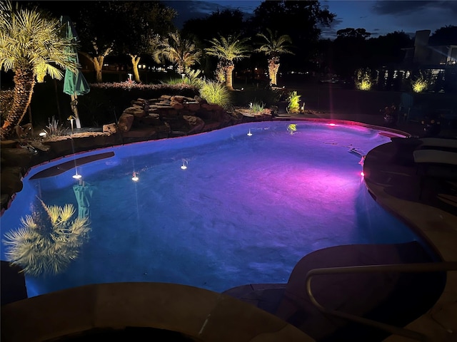 9603 Stonebridge Pl, Tomball, TX 77375 - pool at twilight with an outdoor pool