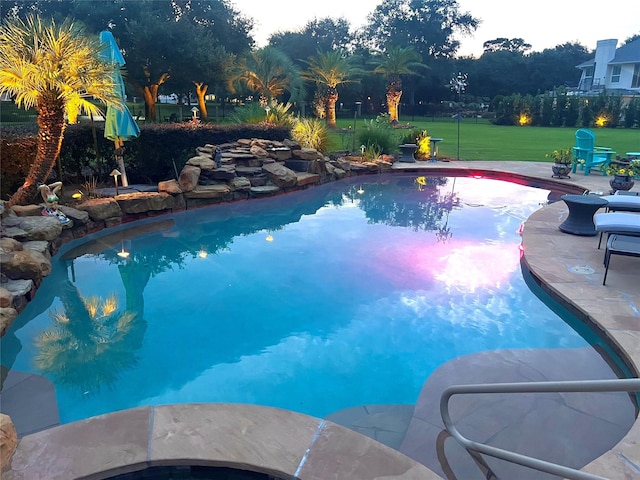 9603 Stonebridge Pl, Tomball, TX 77375 - swimming pool featuring a lawn and a patio