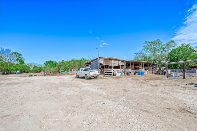 511 Gulf Bank Rd Unit 5, Houston, TX 77037 - view of parking featuring an exterior structure