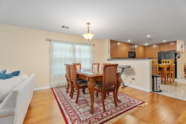 16307 Melody View Ct, Cypress, TX 77429 - dining area featuring light wood-type flooring and recessed lighting