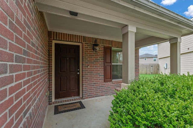 16307 Melody View Ct, Cypress, TX 77429 - view of exterior entry featuring brick siding and covered porch