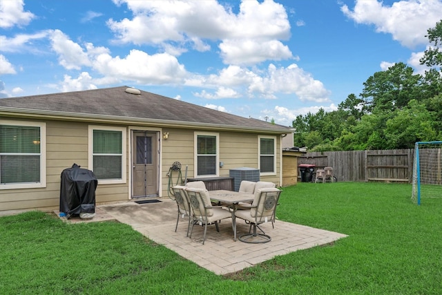 16307 Melody View Ct, Cypress, TX 77429 - fenced backyard with grilling area and a patio area