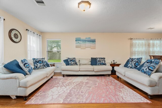 16307 Melody View Ct, Cypress, TX 77429 - living room with wood finished floors and a textured ceiling
