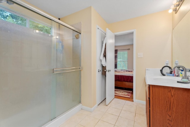 16307 Melody View Ct, Cypress, TX 77429 - bathroom featuring a stall shower, vanity, ensuite bath, and tile patterned floors