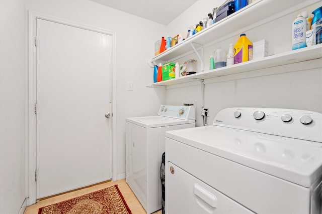 16307 Melody View Ct, Cypress, TX 77429 - washroom featuring washing machine and dryer and light tile patterned floors