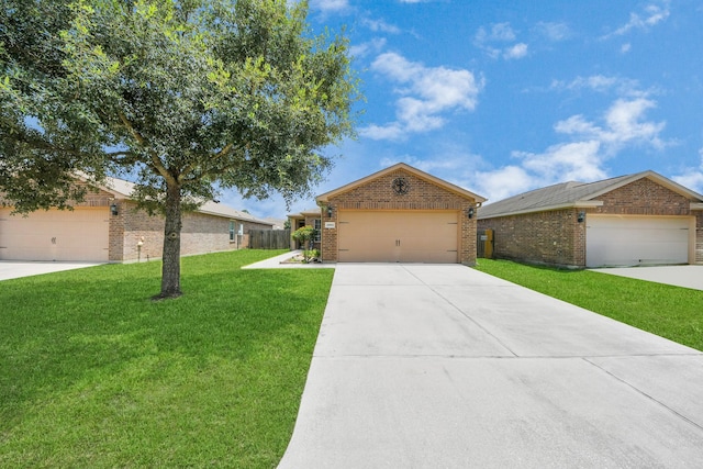 28961 San Bernard River Loop, Spring, TX 77386 - view of front facade with brick siding and a front lawn