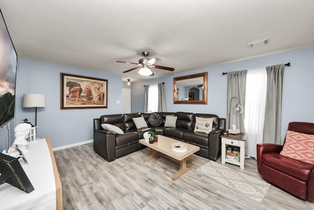 28961 San Bernard River Loop, Spring, TX 77386 - living room with ceiling fan and light wood-style floors
