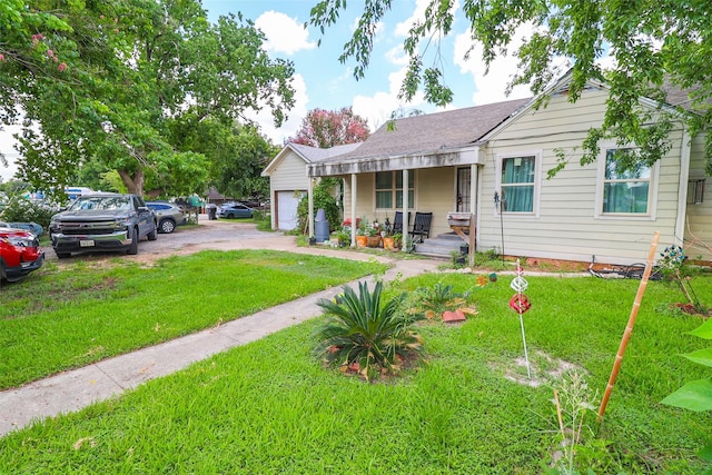 313 E Tidwell Rd, Houston, TX 77022 - bungalow-style house featuring a front lawn and an attached garage