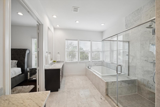 3410 Timbergrove Heights St, Houston, TX 77008 - full bath with vanity, plenty of natural light, a garden tub, a shower stall, and recessed lighting