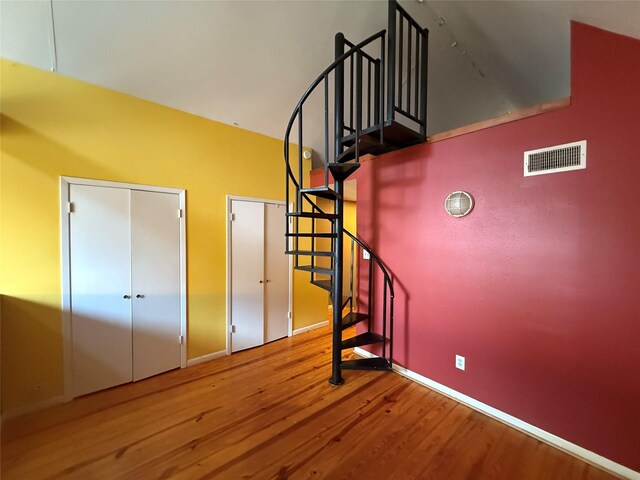 1226 W Drew St Unit B, Houston, TX 77006 - stairs with wood finished floors and baseboards