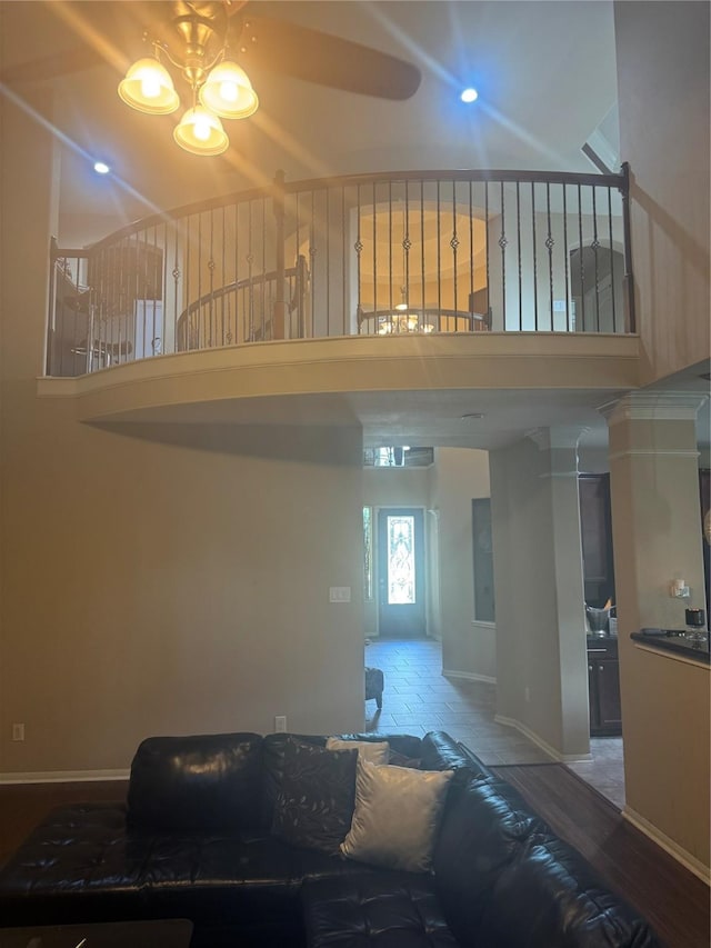 4714 Loggia Ln, Humble, TX 77396 - living room featuring a high ceiling and a ceiling fan