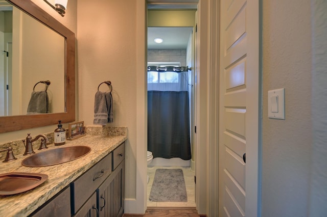 39577 Mesquite Dr, Hempstead, TX 77445 - bathroom with vanity, a shower with shower curtain, and a textured wall