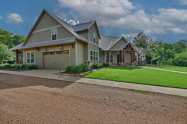 39577 Mesquite Dr, Hempstead, TX 77445 - view of front of property featuring a metal roof, board and batten siding, a standing seam roof, and a front lawn