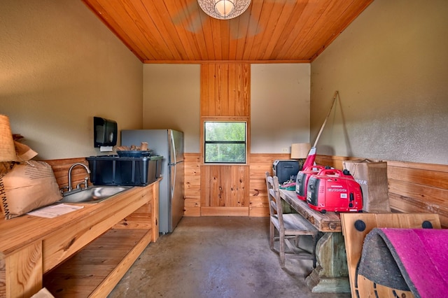 39577 Mesquite Dr, Hempstead, TX 77445 - miscellaneous room with wooden walls, unfinished concrete flooring, and wood ceiling