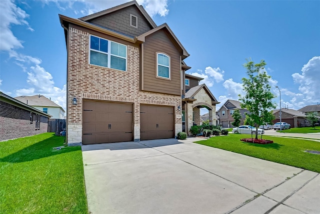 3306 Coopers Ridge Way, Houston, TX 77084 - view of front of home featuring brick siding, an attached garage, driveway, and a front lawn