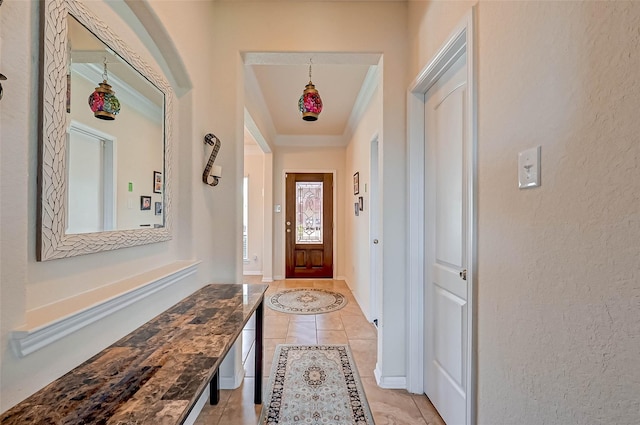 3306 Coopers Ridge Way, Houston, TX 77084 - foyer featuring ornamental molding, light tile patterned flooring, and inlaid floor details