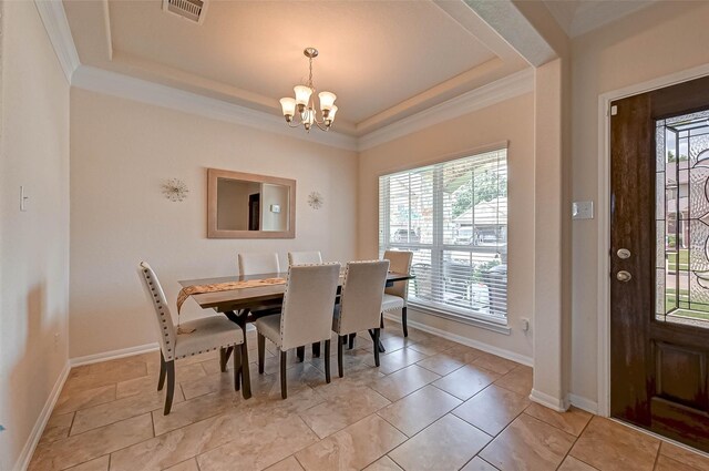3306 Coopers Ridge Way, Houston, TX 77084 - dining room with a chandelier, a tray ceiling, and ornamental molding