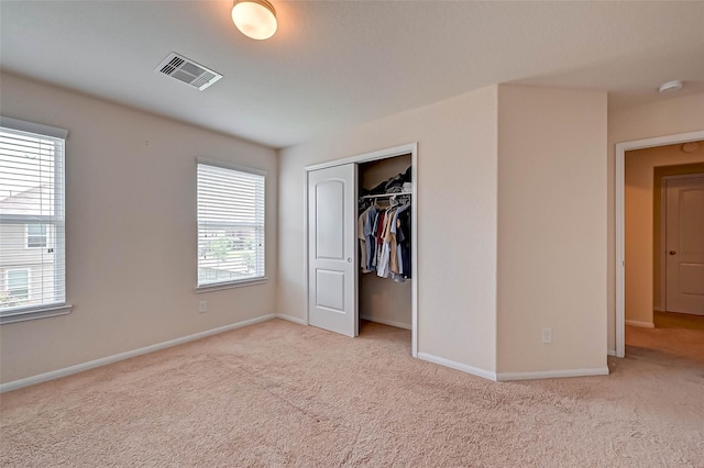 3306 Coopers Ridge Way, Houston, TX 77084 - unfurnished bedroom featuring light colored carpet and a closet
