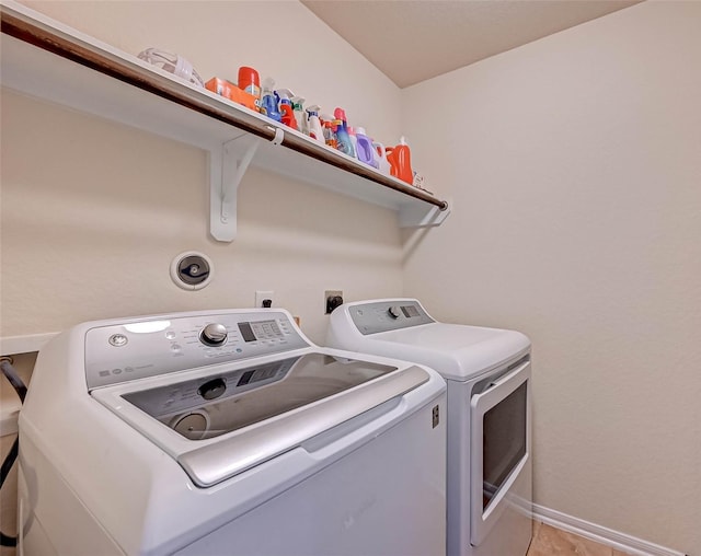 3306 Coopers Ridge Way, Houston, TX 77084 - laundry area featuring separate washer and dryer and light tile patterned flooring