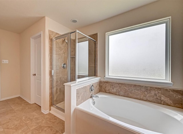 3306 Coopers Ridge Way, Houston, TX 77084 - bathroom featuring a bath and a shower stall